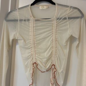 Sheer white and orange top